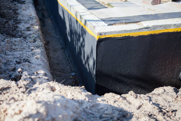 Professional Exterior Waterproofing technician working in Magnolia Springs, AL